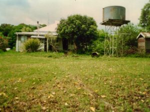 Outside-dunny-and-water-tank-at-Fairview-Armstrong-era